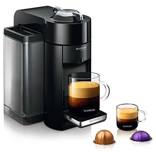 Picture of Evoluo Deluxe coffee machine with glass mug and coffee pods
